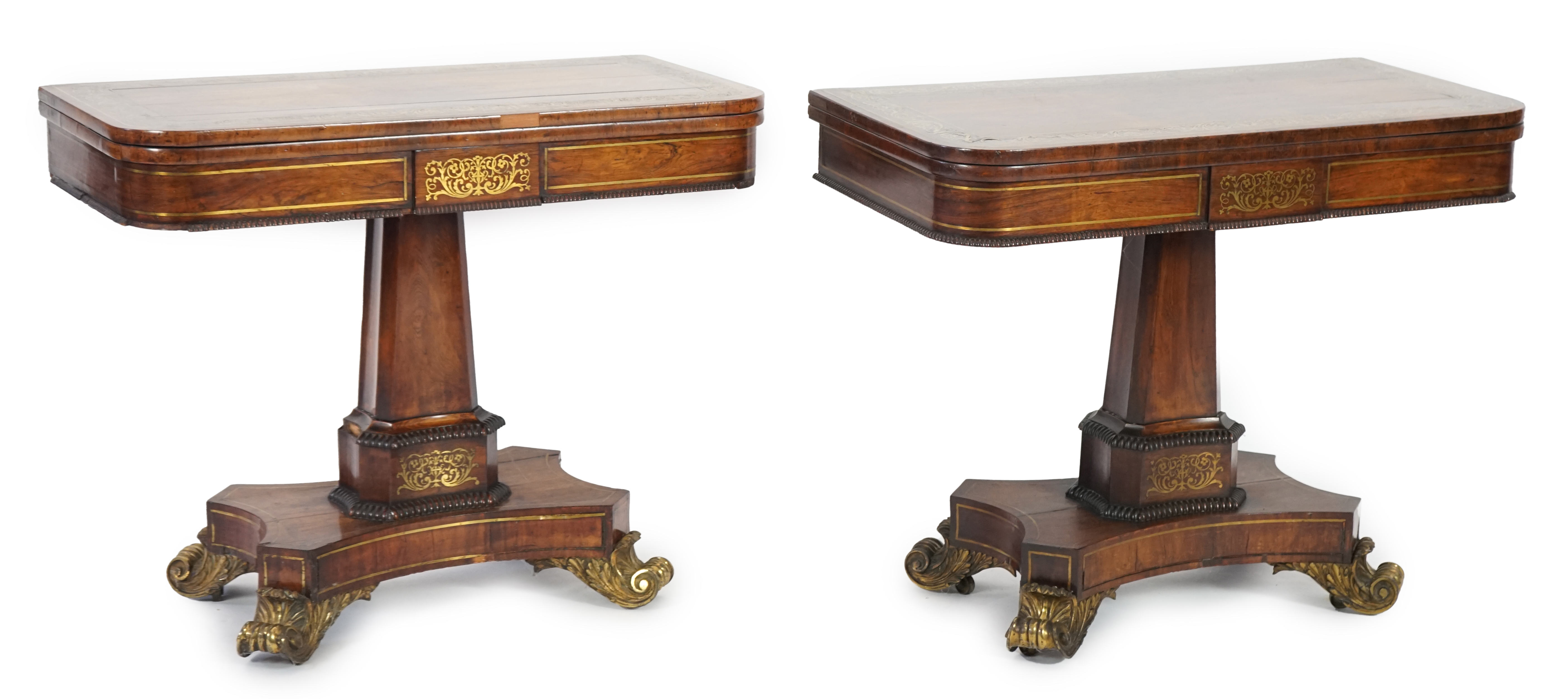 A pair of Regency brass inset rosewood card tables